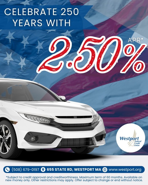 car with american flag behind it