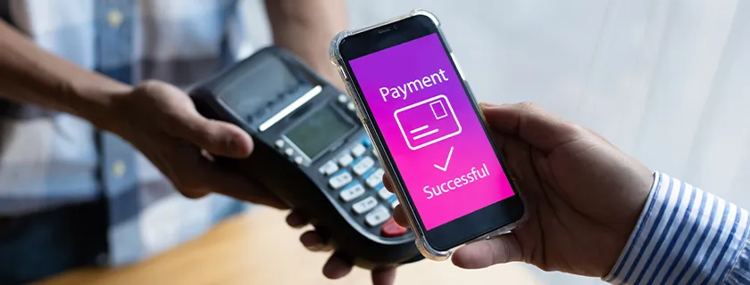 Mobile phone showing successful payment message