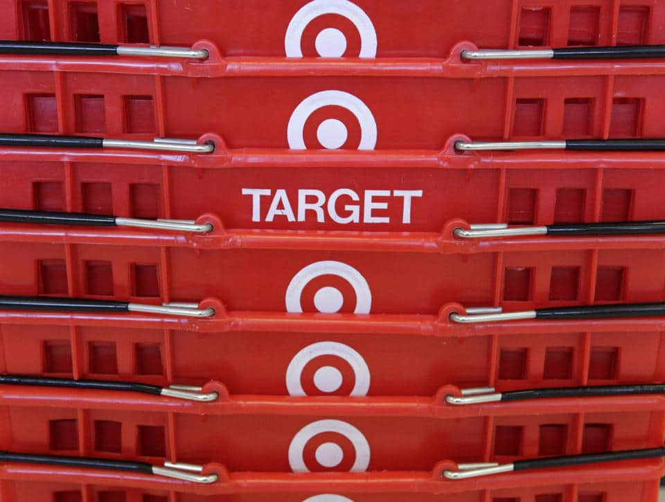 Close-up of stacked red Target shopping baskets with the logo.